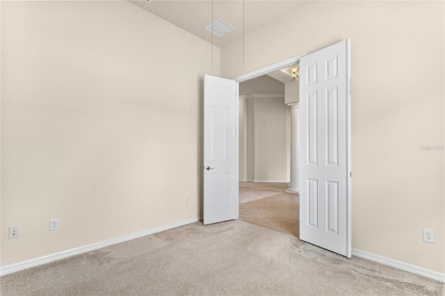 29152 David Ct, Tavares, FL 32778 - unfurnished bedroom featuring carpet flooring and lofted ceiling