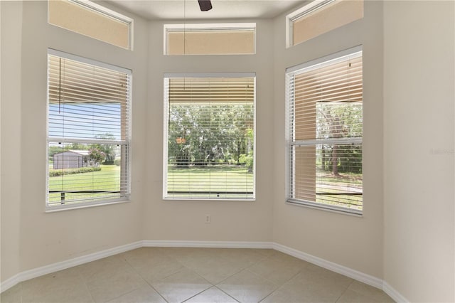 29152 David Ct, Tavares, FL 32778 - empty room featuring light tile patterned floors and ceiling fan