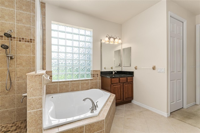 29152 David Ct, Tavares, FL 32778 - full bath featuring a bath, vanity, a tile shower, and tile patterned flooring