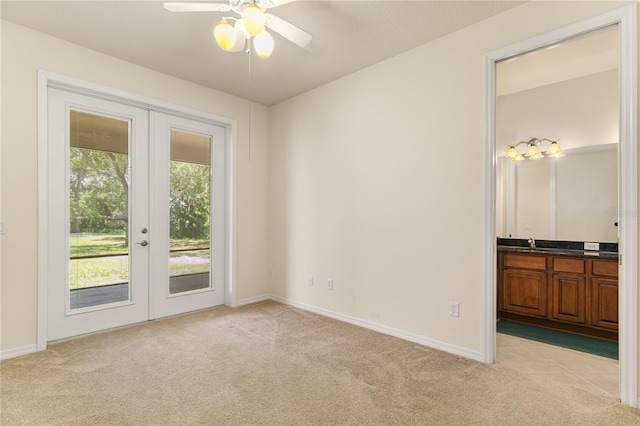 29152 David Ct, Tavares, FL 32778 - empty room with light colored carpet, french doors, and ceiling fan