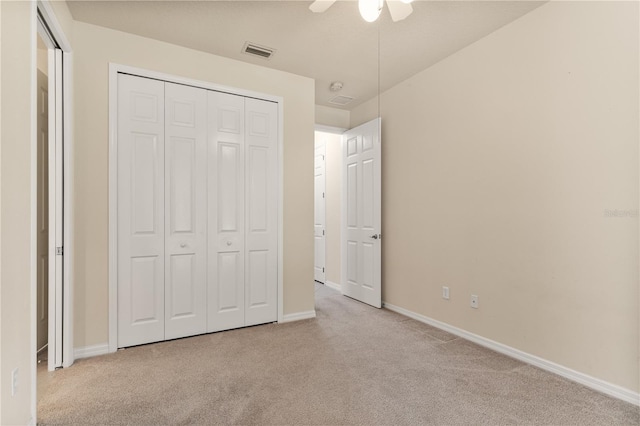 29152 David Ct, Tavares, FL 32778 - unfurnished bedroom with carpet floors, a closet, and a ceiling fan
