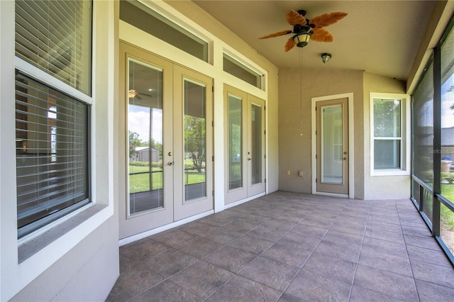 29152 David Ct, Tavares, FL 32778 - unfurnished sunroom featuring french doors and vaulted ceiling