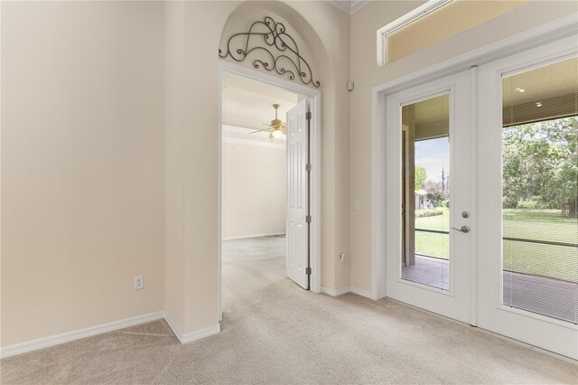 29152 David Ct, Tavares, FL 32778 - empty room featuring light carpet, french doors, and ceiling fan