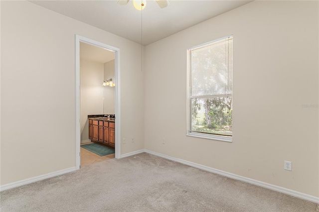 29152 David Ct, Tavares, FL 32778 - empty room featuring light colored carpet and a ceiling fan
