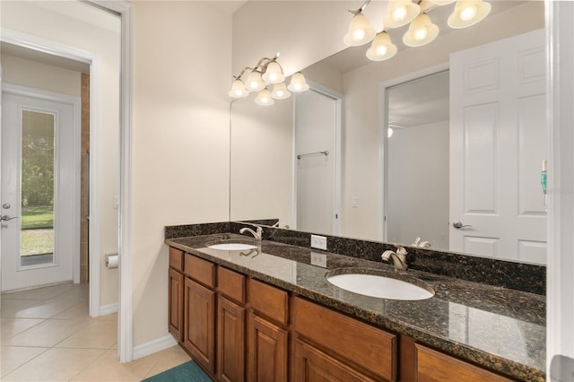 29152 David Ct, Tavares, FL 32778 - full bath with double vanity, tile patterned flooring, and a chandelier