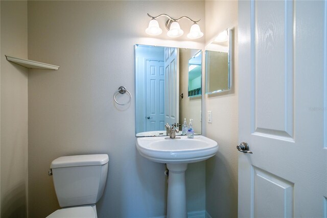 29152 David Ct, Tavares, FL 32778 - half bathroom featuring toilet
