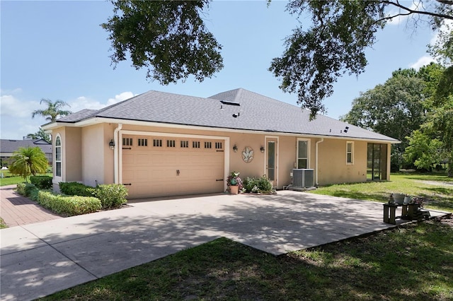29152 David Ct, Tavares, FL 32778 - ranch-style house with a garage, stucco siding, driveway, and a front yard