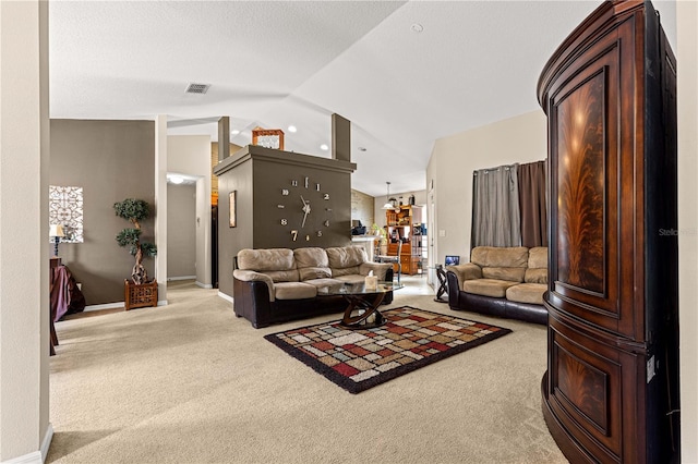 70 Locust Pass Run, Ocala, FL 34472 - living room with carpet floors and vaulted ceiling