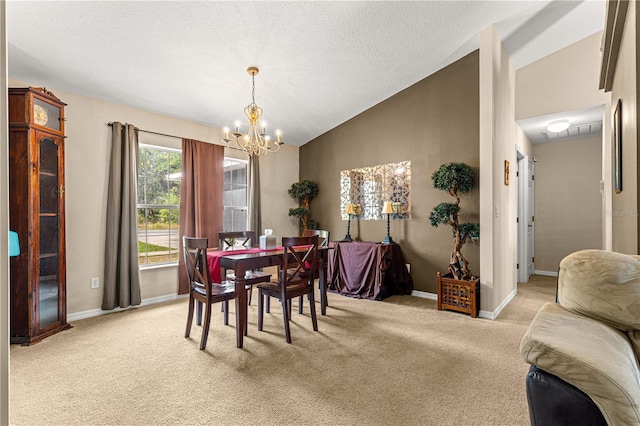 70 Locust Pass Run, Ocala, FL 34472 - dining space featuring a chandelier, vaulted ceiling, light carpet, and a textured ceiling