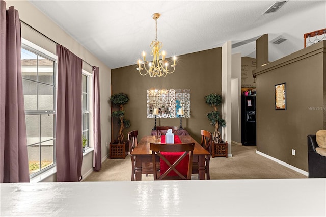 70 Locust Pass Run, Ocala, FL 34472 - dining space with a chandelier, carpet flooring, plenty of natural light, and vaulted ceiling