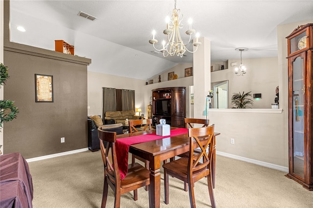 70 Locust Pass Run, Ocala, FL 34472 - dining room with a chandelier, lofted ceiling, and carpet floors