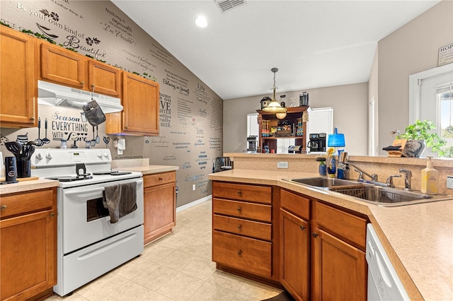 70 Locust Pass Run, Ocala, FL 34472 - kitchen with white appliances, light countertops, under cabinet range hood, brown cabinetry, and decorative light fixtures