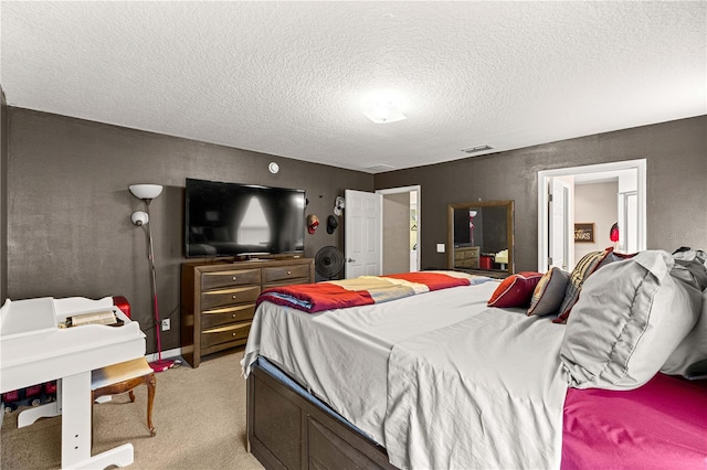 70 Locust Pass Run, Ocala, FL 34472 - bedroom featuring a textured ceiling and light colored carpet