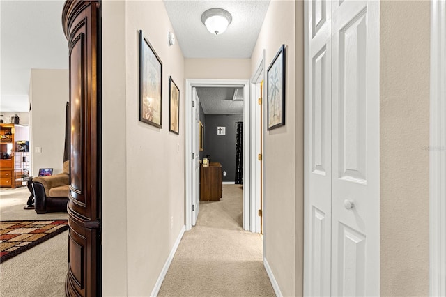 70 Locust Pass Run, Ocala, FL 34472 - corridor with light carpet and a textured ceiling