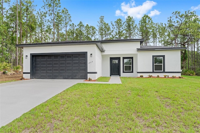 1809 W Linden Dr, Citrus Springs, FL 34434 - modern home featuring an attached garage, stucco siding, driveway, and a front yard