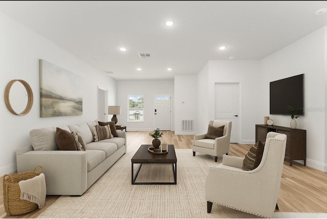 1809 W Linden Dr, Citrus Springs, FL 34434 - living area featuring light wood-style flooring and recessed lighting