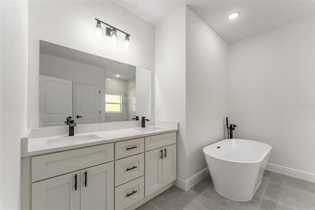 1809 W Linden Dr, Citrus Springs, FL 34434 - bathroom featuring double vanity, a freestanding bath, a shower stall, and tile patterned floors