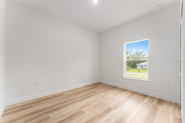 1809 W Linden Dr, Citrus Springs, FL 34434 - empty room with light wood-style flooring and baseboards