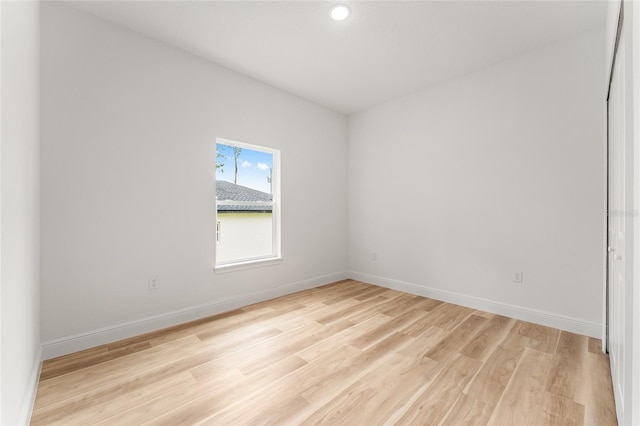 1809 W Linden Dr, Citrus Springs, FL 34434 - empty room with light wood finished floors and recessed lighting