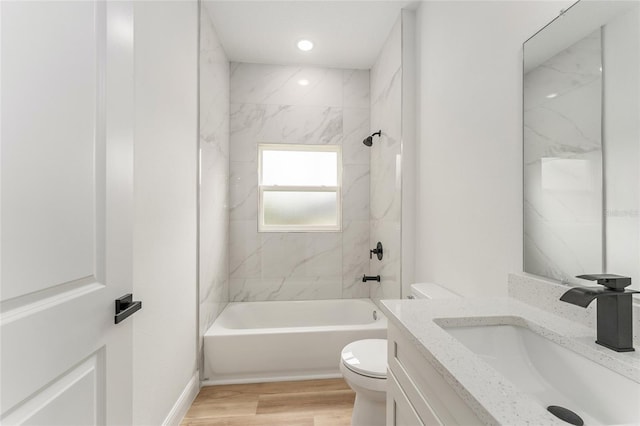 1809 W Linden Dr, Citrus Springs, FL 34434 - bathroom with vanity, shower / bathtub combination, and wood finished floors