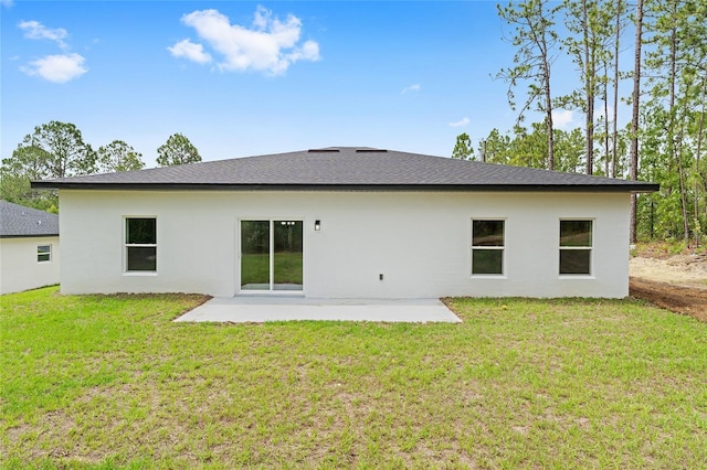 1809 W Linden Dr, Citrus Springs, FL 34434 - rear view of property with a patio, stucco siding, a yard, and a shingled roof