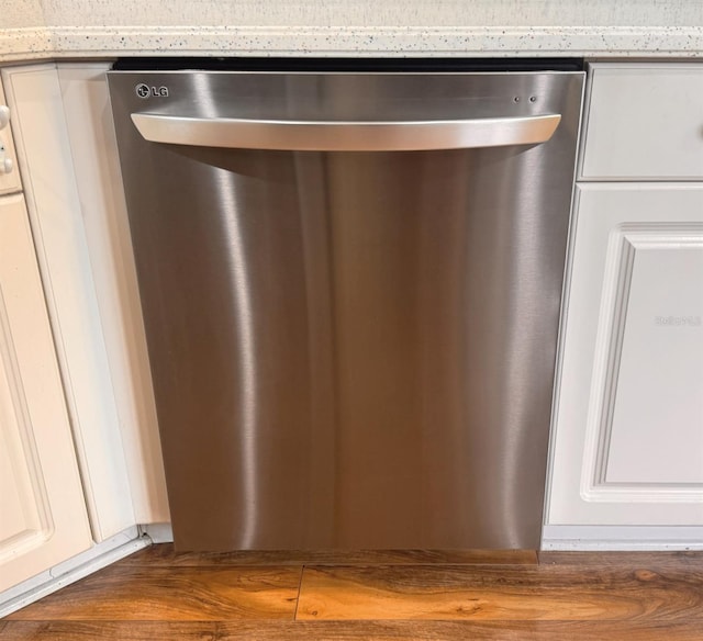 1180 Mesa Verde Ct, Clermont, FL 34711 - kitchen view of stainless steel dishwasher and white cabinets