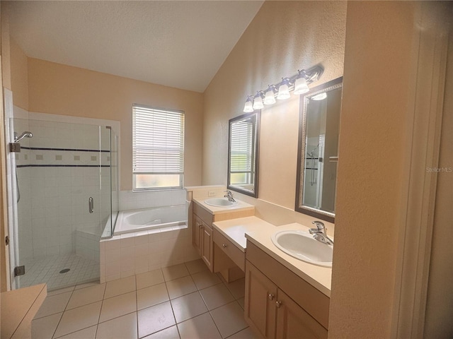 1180 Mesa Verde Ct, Clermont, FL 34711 - bathroom featuring a shower stall, tile patterned floors, vanity, a bath, and lofted ceiling