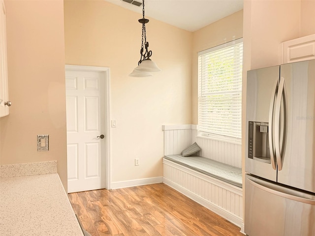 1180 Mesa Verde Ct, Clermont, FL 34711 - unfurnished dining area featuring light wood finished floors and baseboards