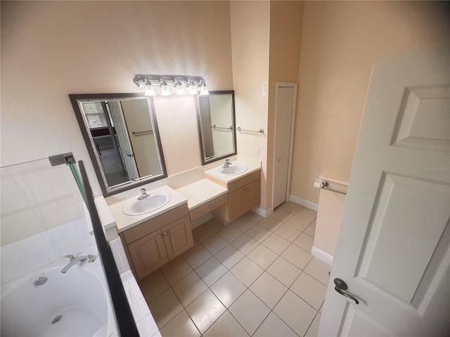 1180 Mesa Verde Ct, Clermont, FL 34711 - bathroom featuring double vanity, tile patterned flooring, and a garden tub