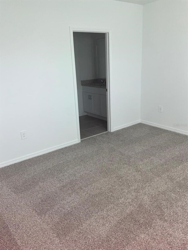 4957 Kaia Ave, Winter Haven, FL 33884 - unfurnished room with carpet flooring and baseboards