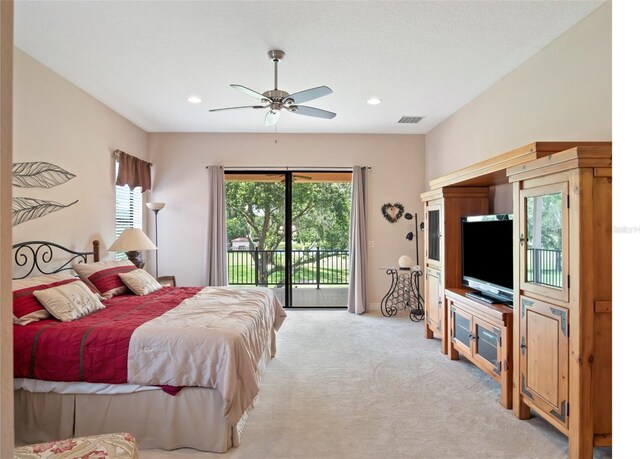 9335 San Jose Blvd, Howey In The Hills, FL 34737 - bedroom featuring access to exterior, light carpet, recessed lighting, and a ceiling fan