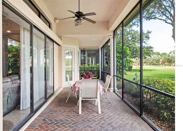 9335 San Jose Blvd, Howey In The Hills, FL 34737 - sunroom / solarium featuring a ceiling fan and healthy amount of natural light