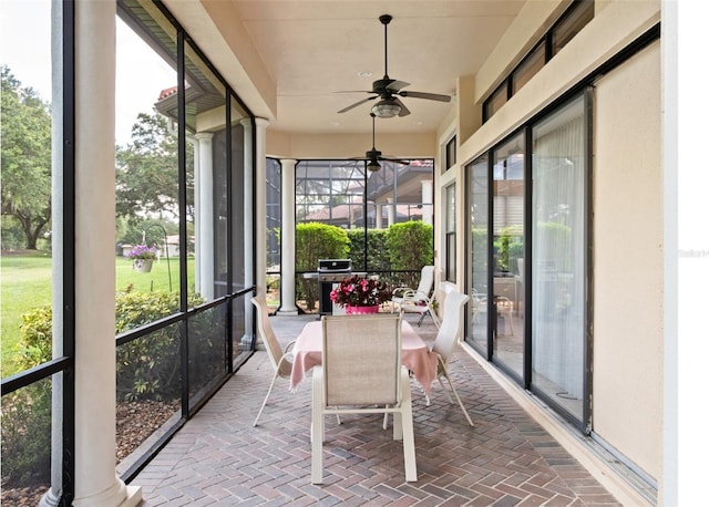 9335 San Jose Blvd, Howey In The Hills, FL 34737 - sunroom featuring a ceiling fan