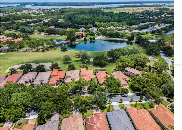 9335 San Jose Blvd, Howey In The Hills, FL 34737 - aerial perspective of suburban area featuring a large body of water and a golf course