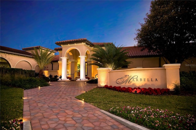 9335 San Jose Blvd, Howey In The Hills, FL 34737 - view of front of house featuring stucco siding and a tiled roof
