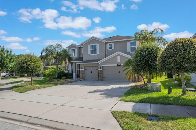 637 Neptune Dr, Groveland, FL 34736 - view of front facade with a garage, concrete driveway, and stone siding