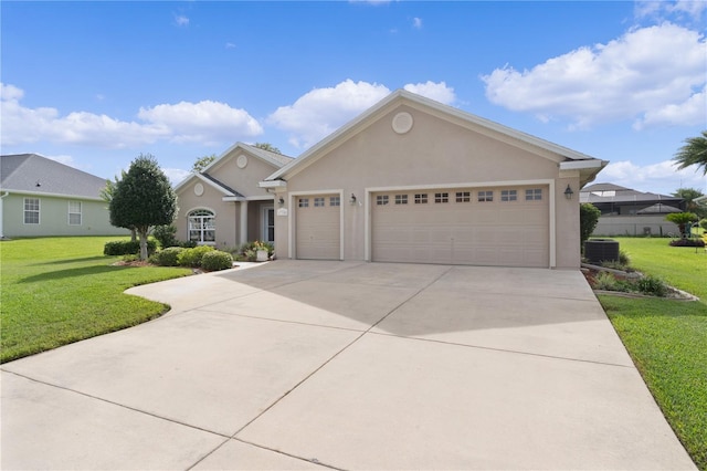 17355 SE 110th Ter, Summerfield, FL 34491 - ranch-style house featuring a garage, concrete driveway, a front yard, and stucco siding
