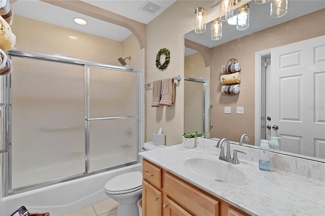 17355 SE 110th Ter, Summerfield, FL 34491 - full bathroom with vanity, tile patterned flooring, enclosed tub / shower combo, and recessed lighting