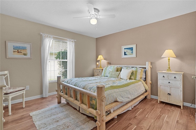 17355 SE 110th Ter, Summerfield, FL 34491 - bedroom featuring light wood-style floors and ceiling fan