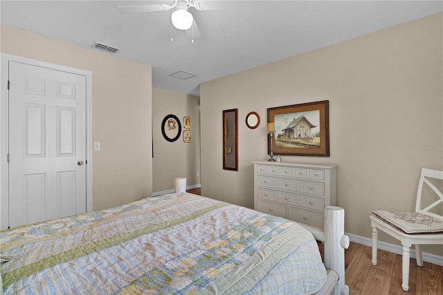 17355 SE 110th Ter, Summerfield, FL 34491 - bedroom featuring wood finished floors and ceiling fan