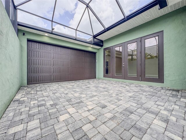 3021 King Palm Dr, New Smyrna Beach, FL 32168 - garage with french doors and decorative driveway