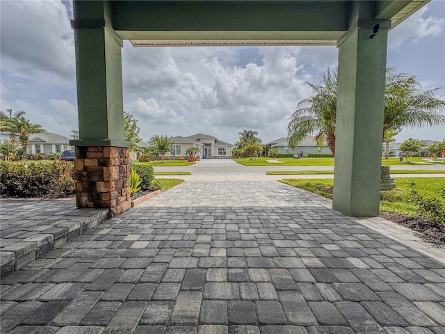 3021 King Palm Dr, New Smyrna Beach, FL 32168 - view of patio / terrace featuring a residential view and decorative driveway