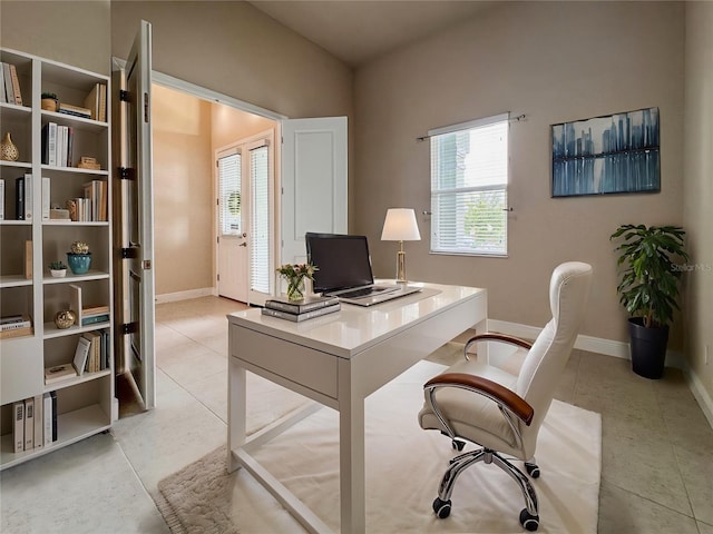 3021 King Palm Dr, New Smyrna Beach, FL 32168 - office area with healthy amount of natural light and light tile patterned floors
