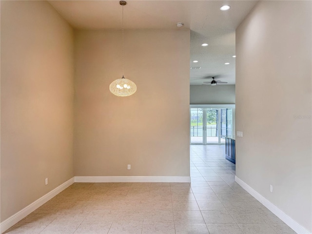 3021 King Palm Dr, New Smyrna Beach, FL 32168 - empty room featuring recessed lighting, light tile patterned floors, a chandelier, ceiling fan, and a towering ceiling