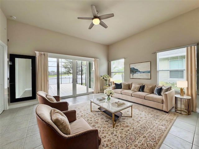 3021 King Palm Dr, New Smyrna Beach, FL 32168 - living room with light tile patterned flooring and ceiling fan