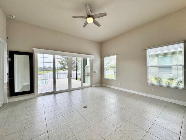 3021 King Palm Dr, New Smyrna Beach, FL 32168 - unfurnished room featuring a ceiling fan, light tile patterned flooring, and a smoke detector