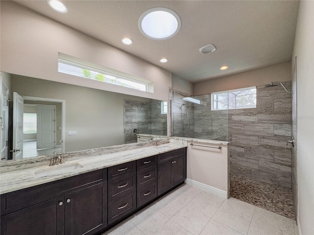 3021 King Palm Dr, New Smyrna Beach, FL 32168 - full bath with walk in shower, double vanity, recessed lighting, and tile patterned flooring