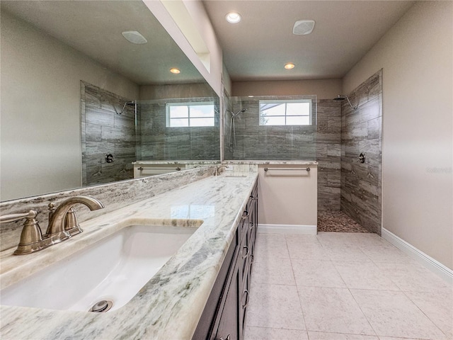 3021 King Palm Dr, New Smyrna Beach, FL 32168 - full bathroom featuring a walk in shower, double vanity, tile patterned floors, and recessed lighting