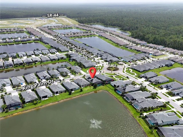 3021 King Palm Dr, New Smyrna Beach, FL 32168 - aerial view of property's location with nearby suburban area and a large body of water