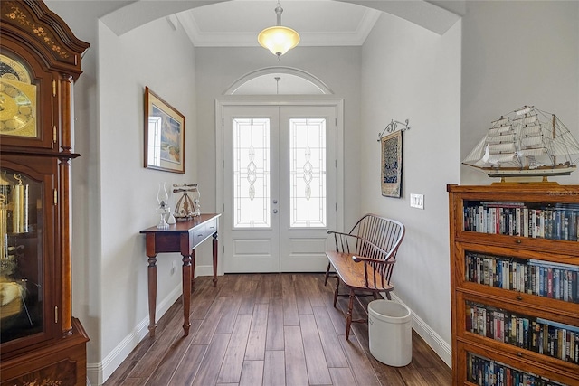 6008 Apex Way, Lady Lake, FL 32159 - entryway with arched walkways, dark wood-type flooring, baseboards, and ornamental molding